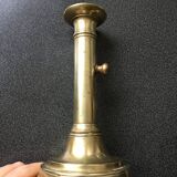 Brass candle holder with push button