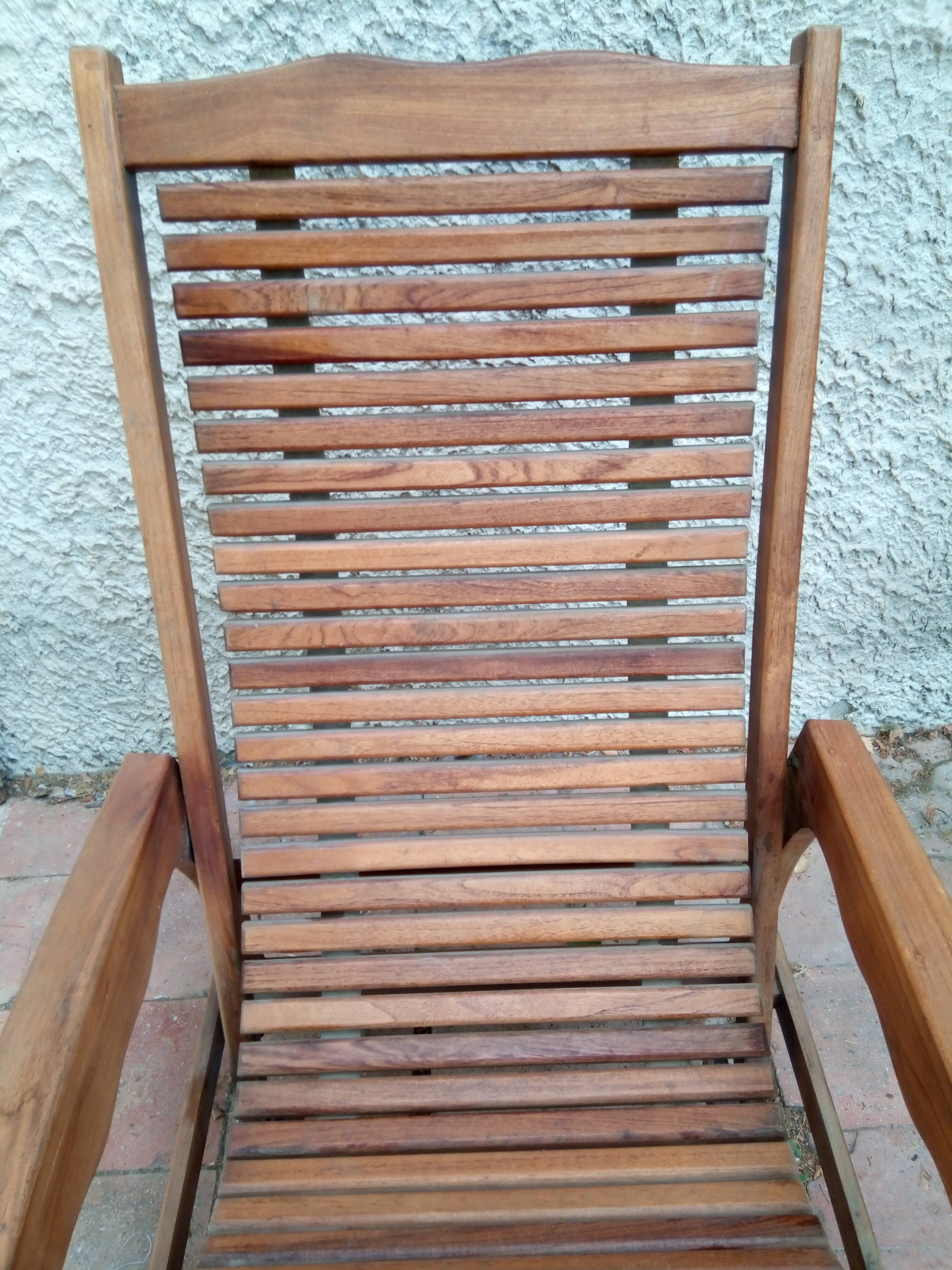 Teak stretchy long chair.