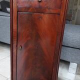 marble-top bedside table