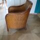 Woven rattan armchair and exotic wood in colonial style, 1980s.