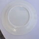 Set of 4 white and blue dinner plates.