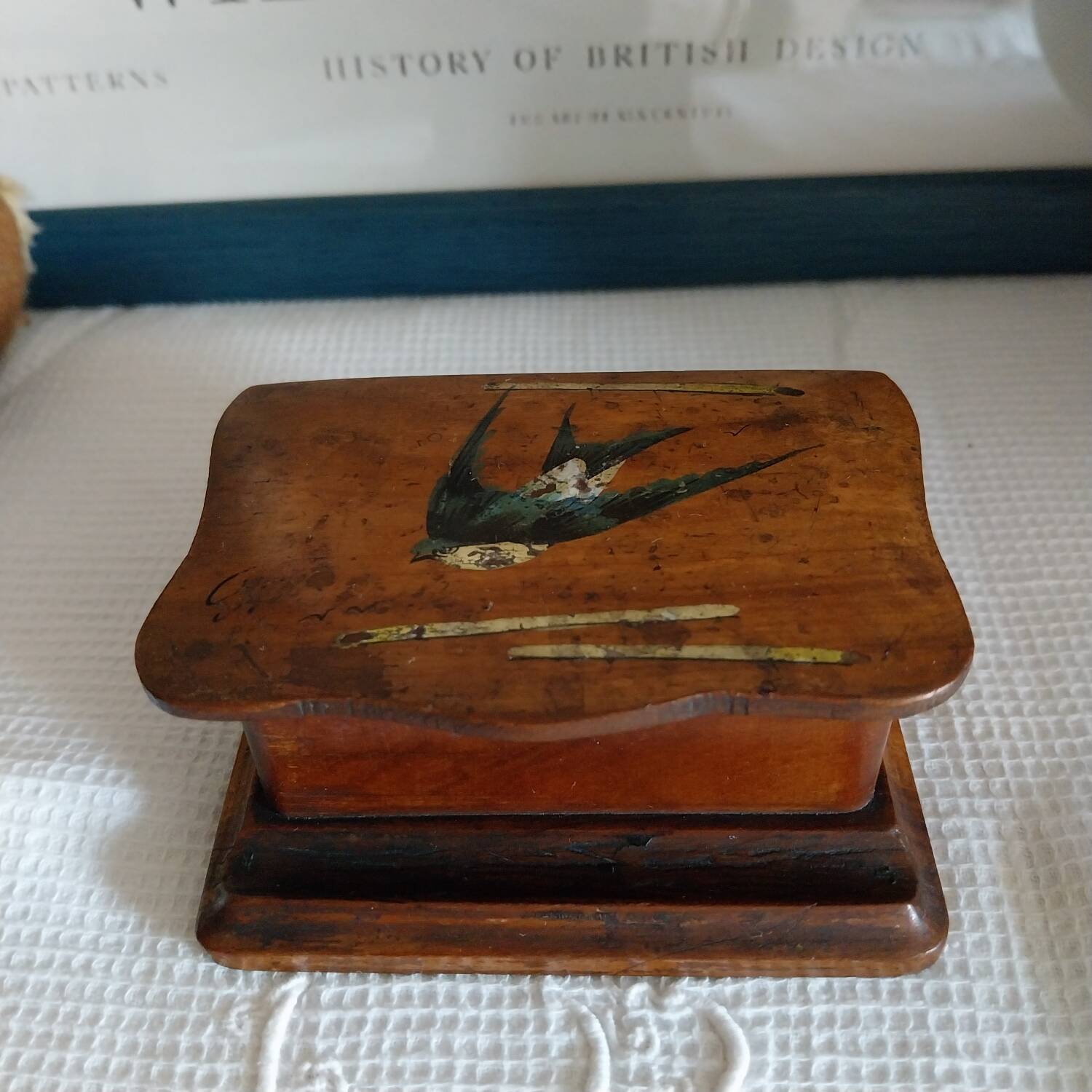 Old wooden feather box