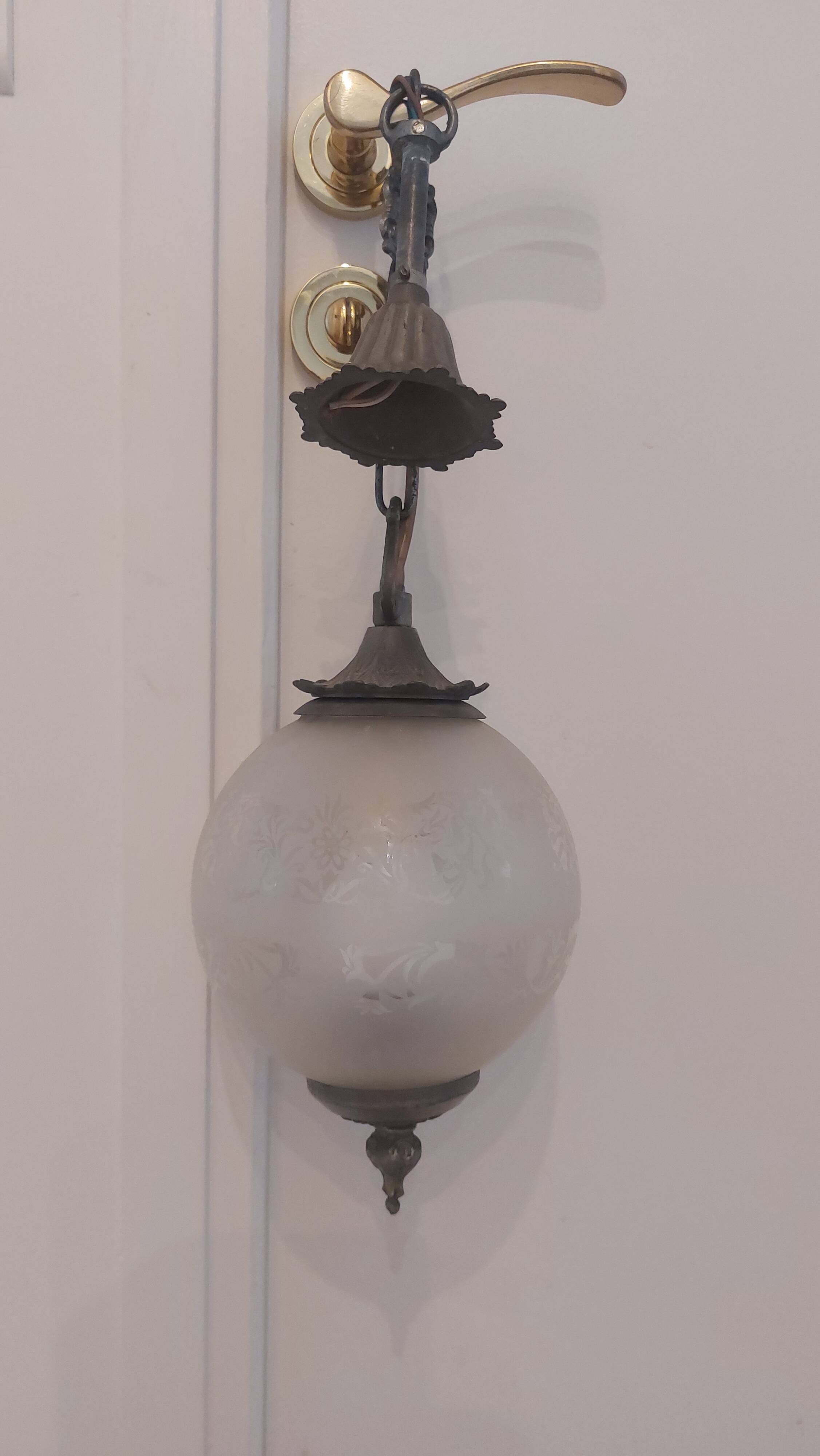 Lots of 1950s copper/ brass suspensions and wall lights with shades.