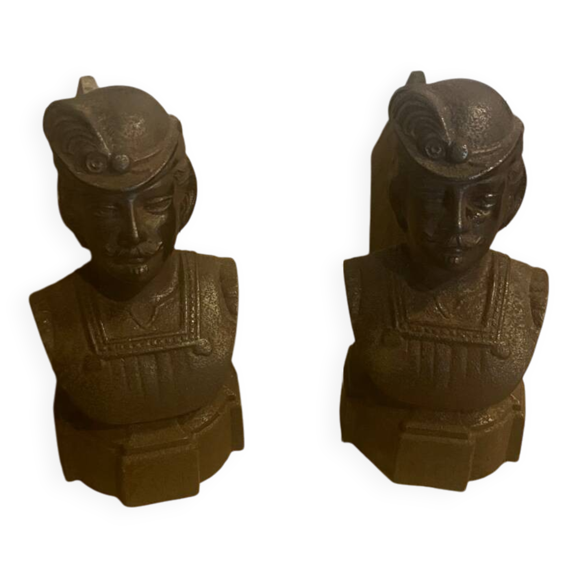 Pair of cast iron andirons with face