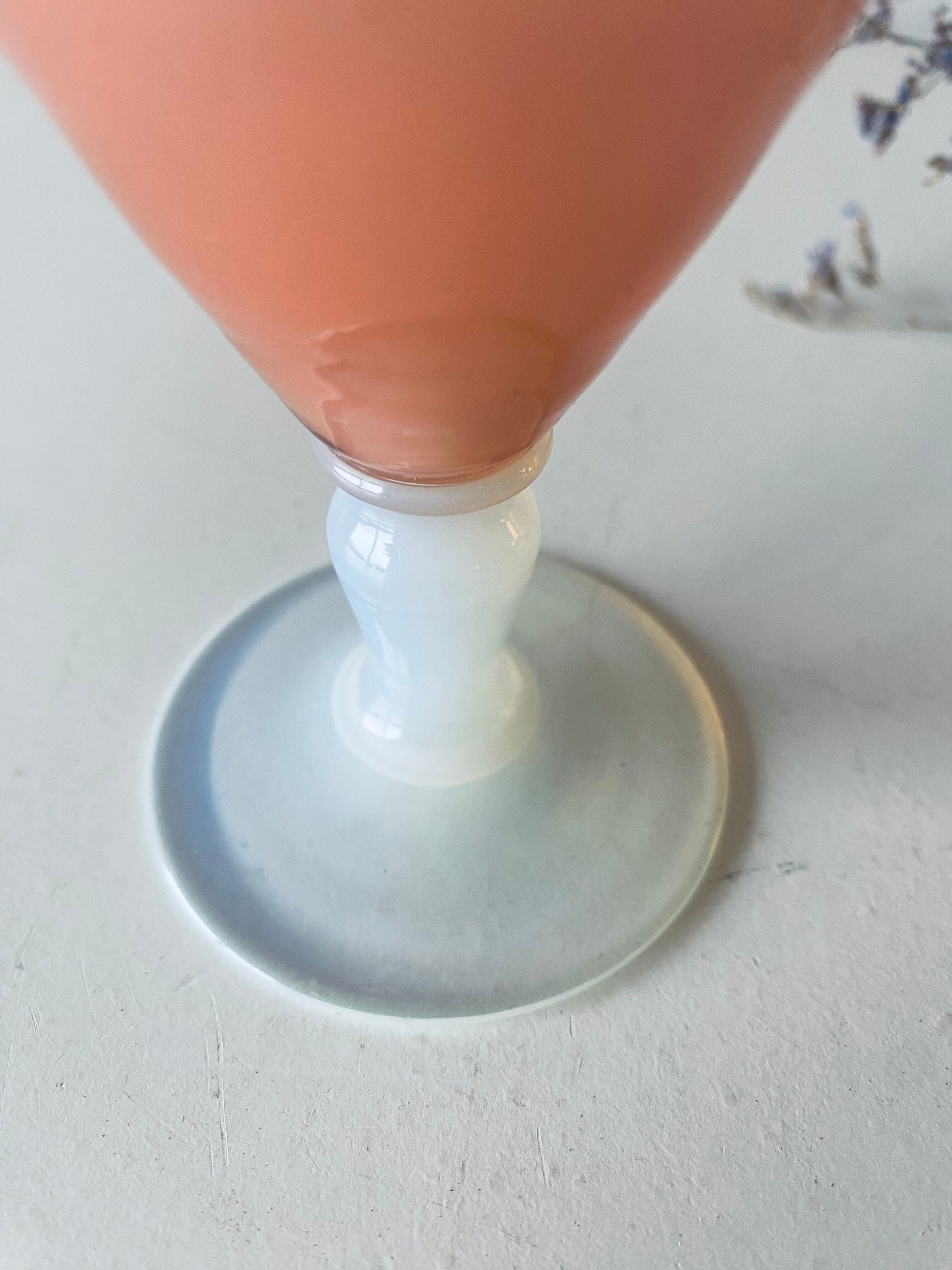 Old vase in pink opaline