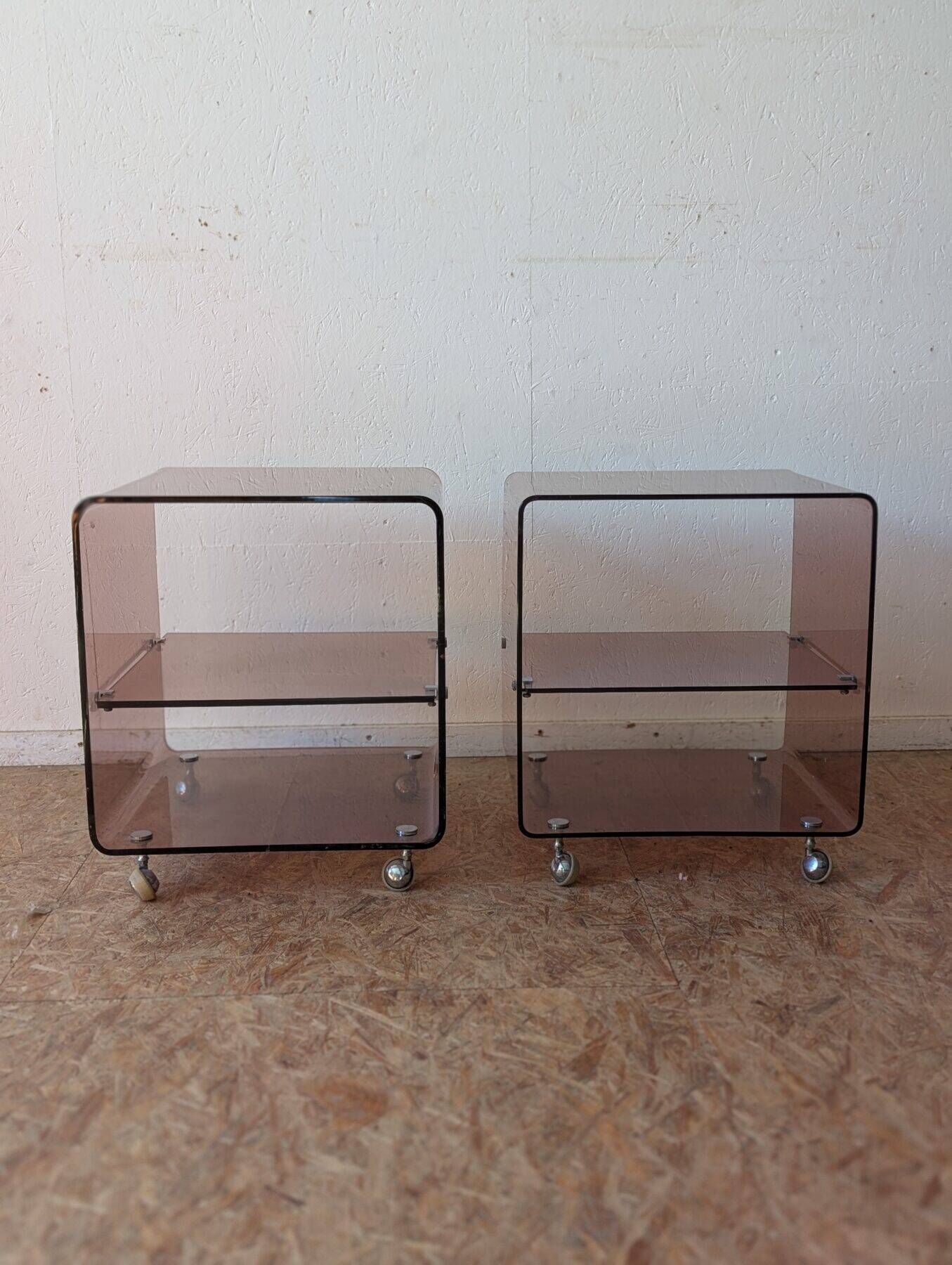 Pair of vintage smoked plexiglass bedside tables or accent furniture.