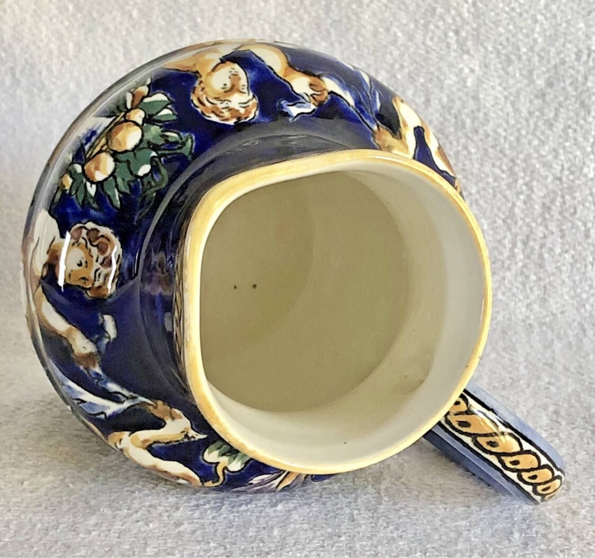 Old cream jug Gien Renaissance blue background 1938/1960