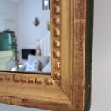 Miroir ancien en bois et stuc doré