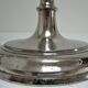 three brass and chrome candle holders early twentieth century