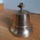 Wall entrance bell with bracket