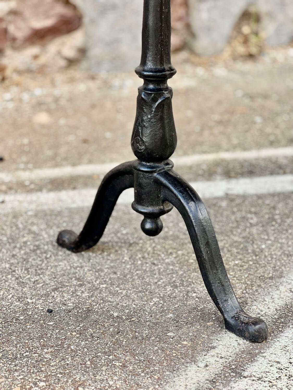 Antique bistro table with cast iron legs