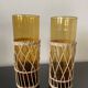 Set of 2 smoked orangeade glasses in woven wicker