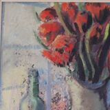 Bouquet rouge et bouteille de vin