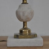 Ancient alabaster lamp and bronze cherub decoration