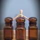 Trio bottles brown round cap