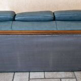 Three-seater sofa in green leather with a solid wood frame