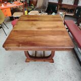 Art Deco extendable table in solid wood and brass.
