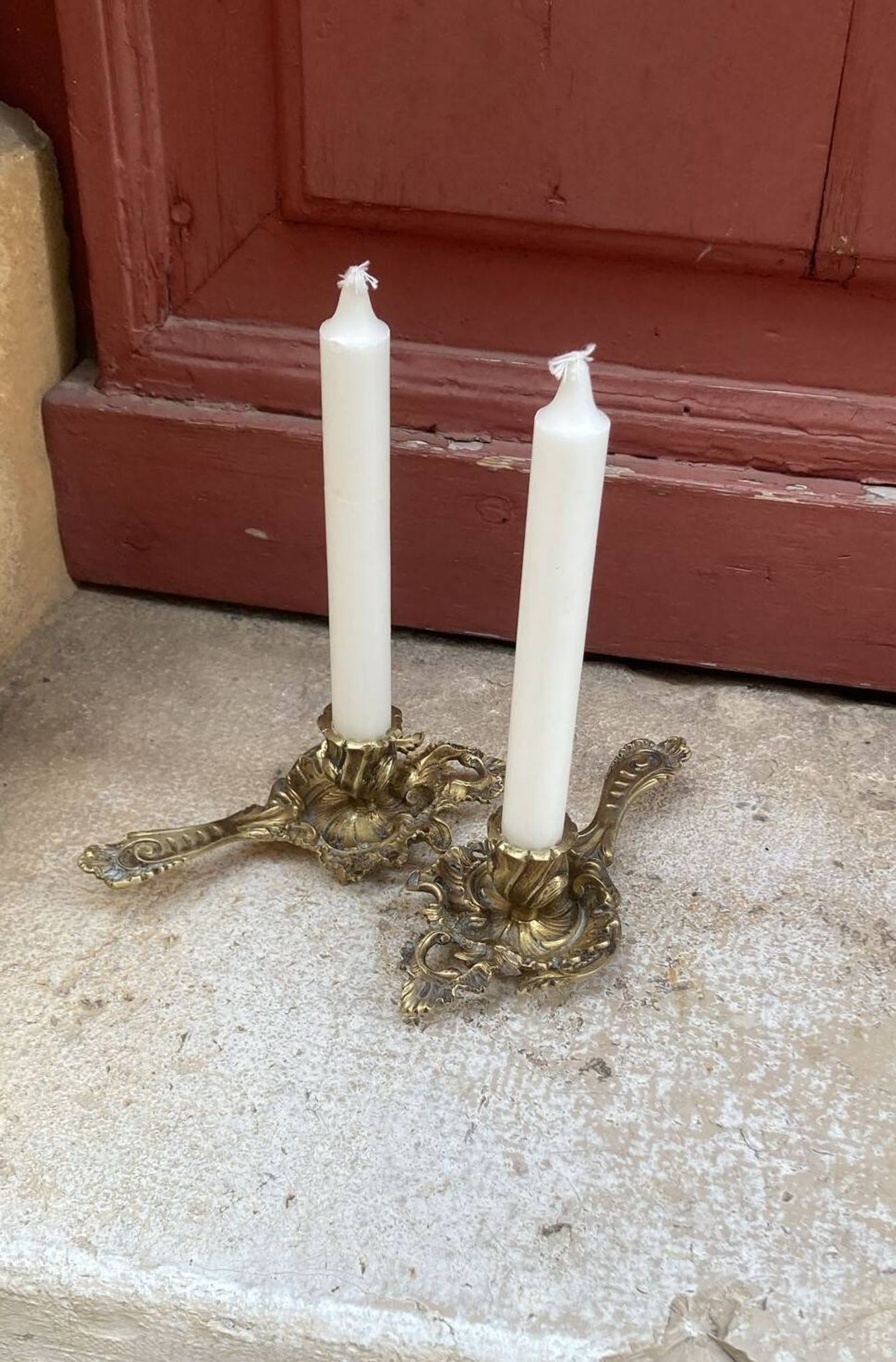 Pair of hand candlesticks / bronze candle holders