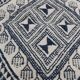 Traditional white and blue hand-woven wool carpet