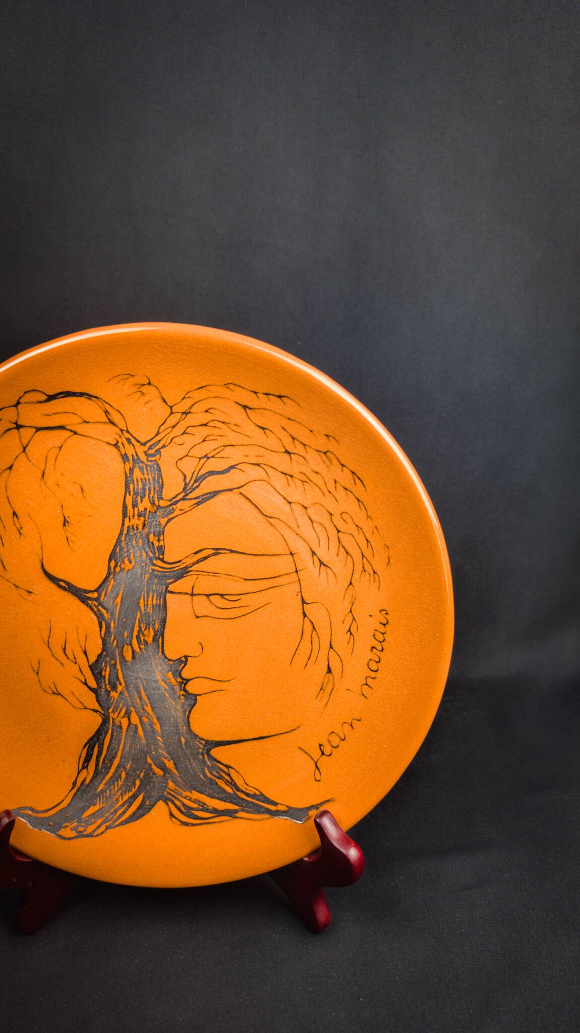 Glazed ceramic plate signed Jean Marais face & tree Vallauris