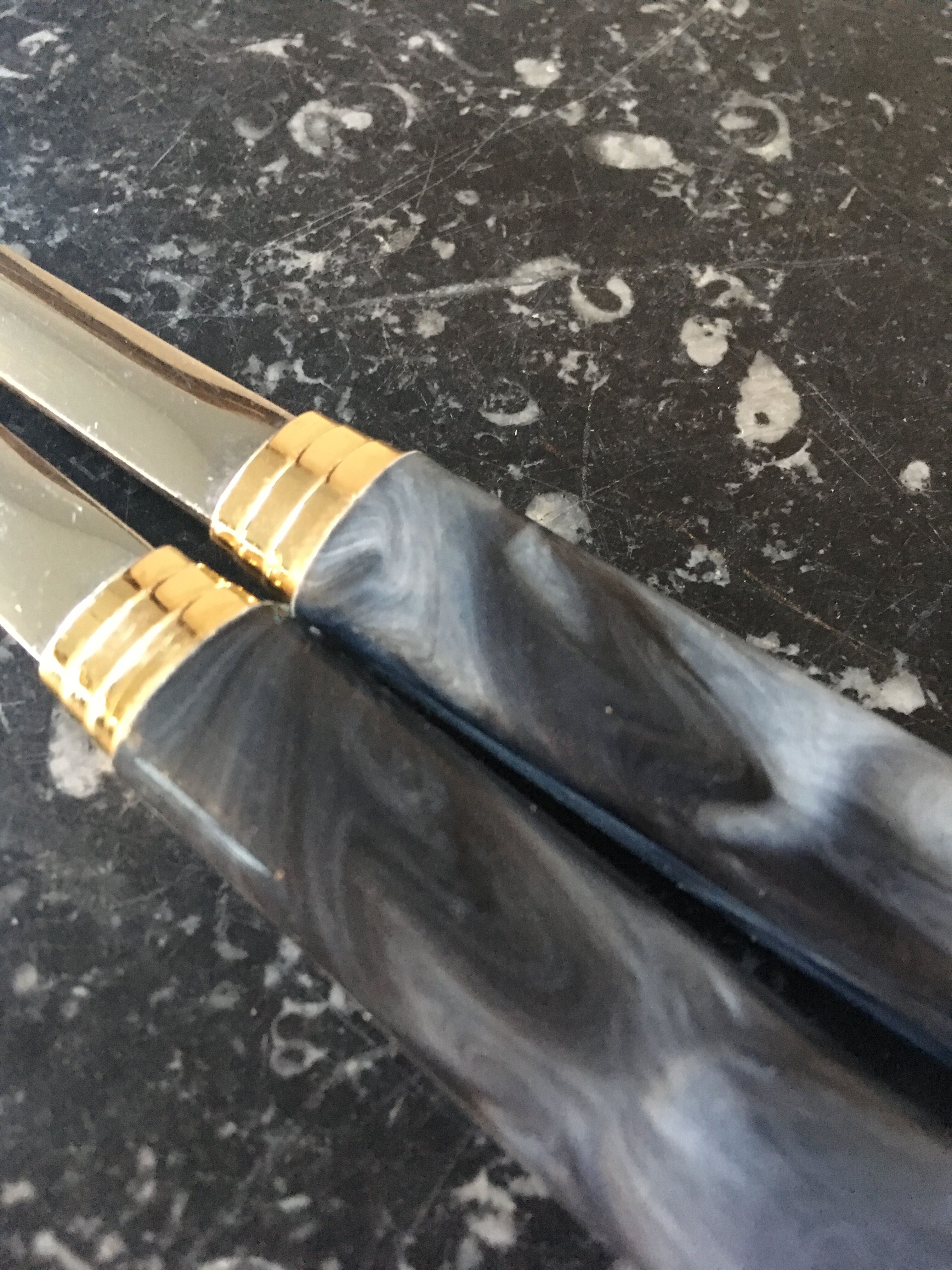 Guy Degrenne salad cutlery in stainless steel and bakelite