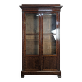 Louis-Philippe mahogany display cabinet with two glass doors.