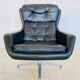 Vintage Danish swivel chair in black leather by Bramin