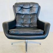 Vintage Danish swivel chair in black leather by Bramin