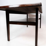 Coffee table in rosewood with shelf, of danish design from the 1960s