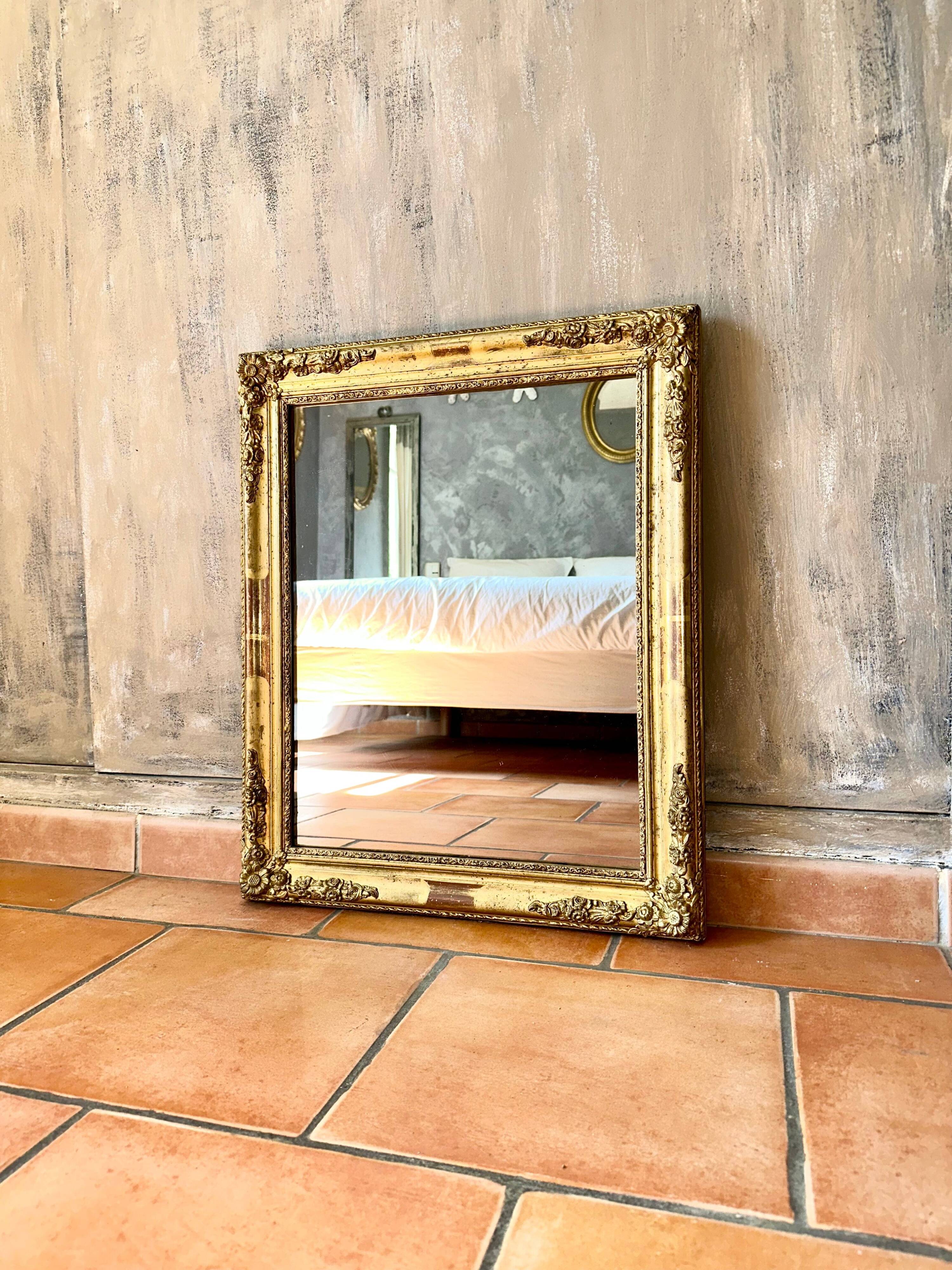Miroir en stuc doré, début XIXème