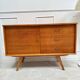 Sideboard with compass feet