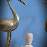 Duo brass herons