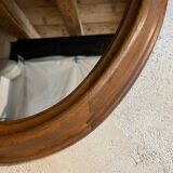 Antique oval walnut mirror