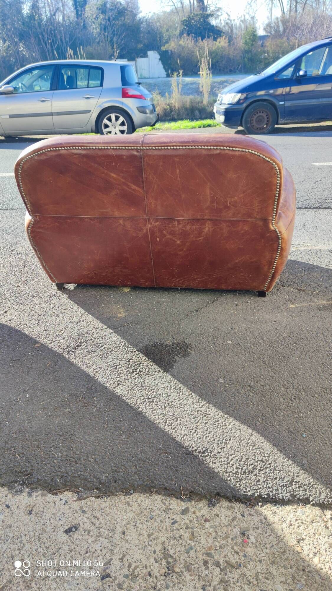Club sofa 2 places in leather beautiful patina around 1980