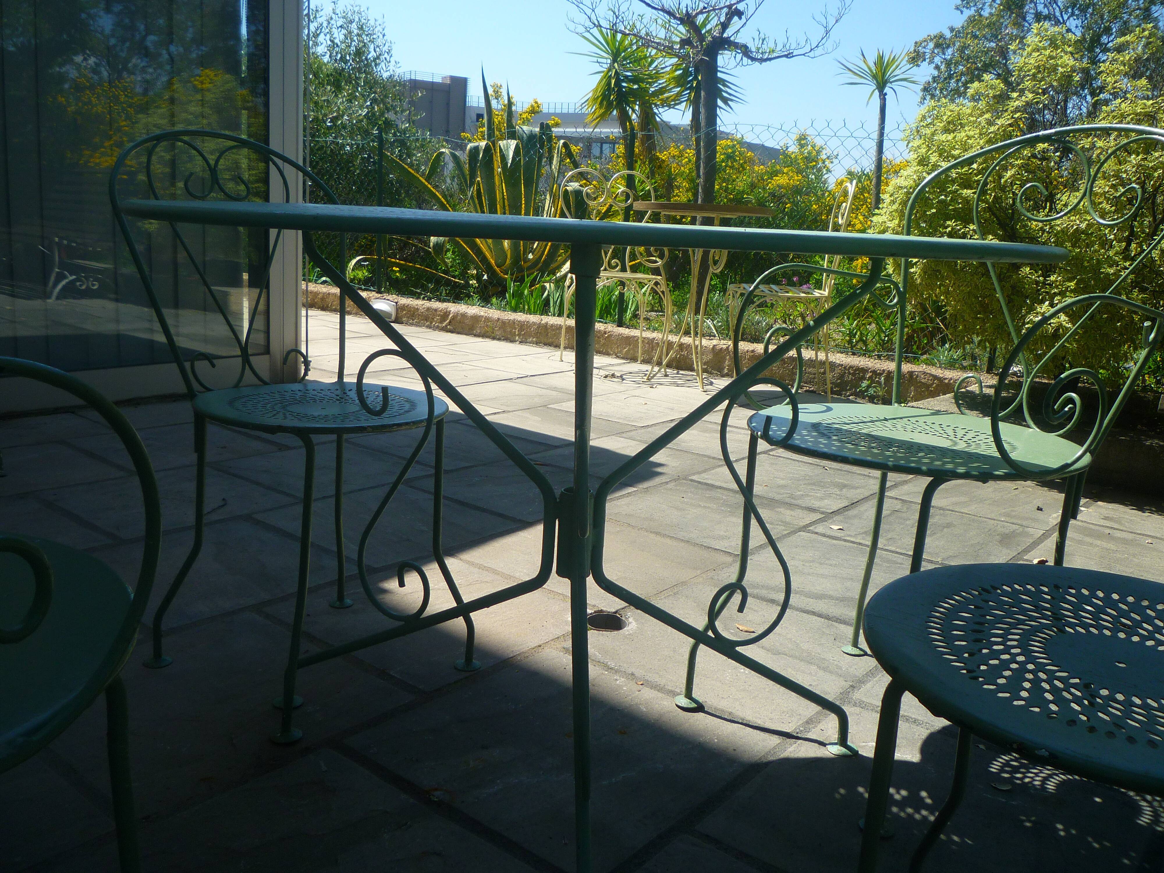 Former garden furniture in wrought iron