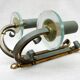 Pair of art deco lacquered metal, brass and glass wall lights