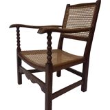 Fauteuil Art Déco en chêne tressé, design minimaliste.