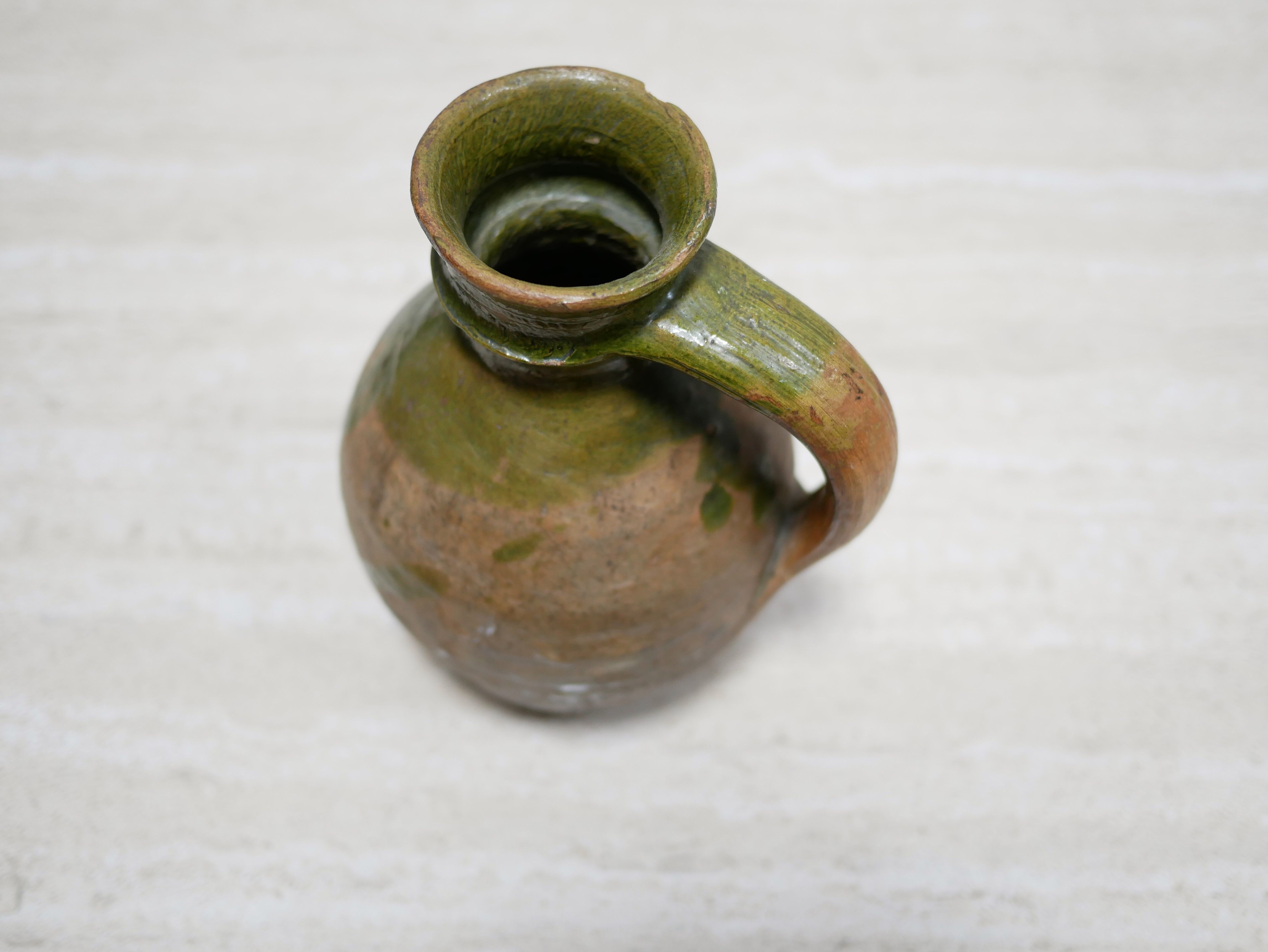 Old glazed terracotta jar