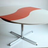 Ying-Yang round orange extendable dining table, 1970s.
