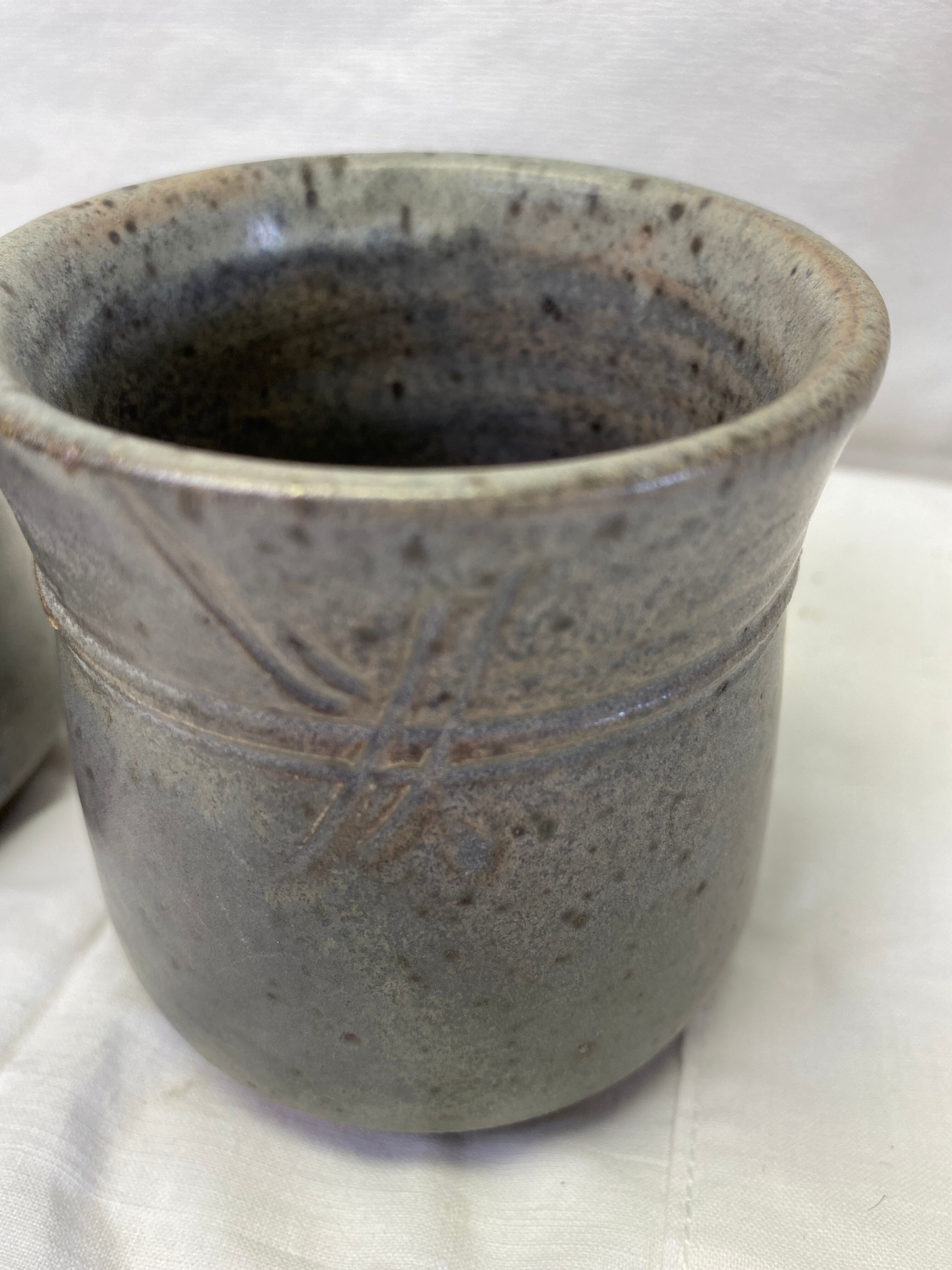 Set of 2 signed blue sandstone cups