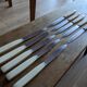 Set of 10 vintage stainless steel and bakelite table knives