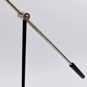 Articulated floor lamp with counterweight mid-century by Rupert Nikoll, nickel, brass.