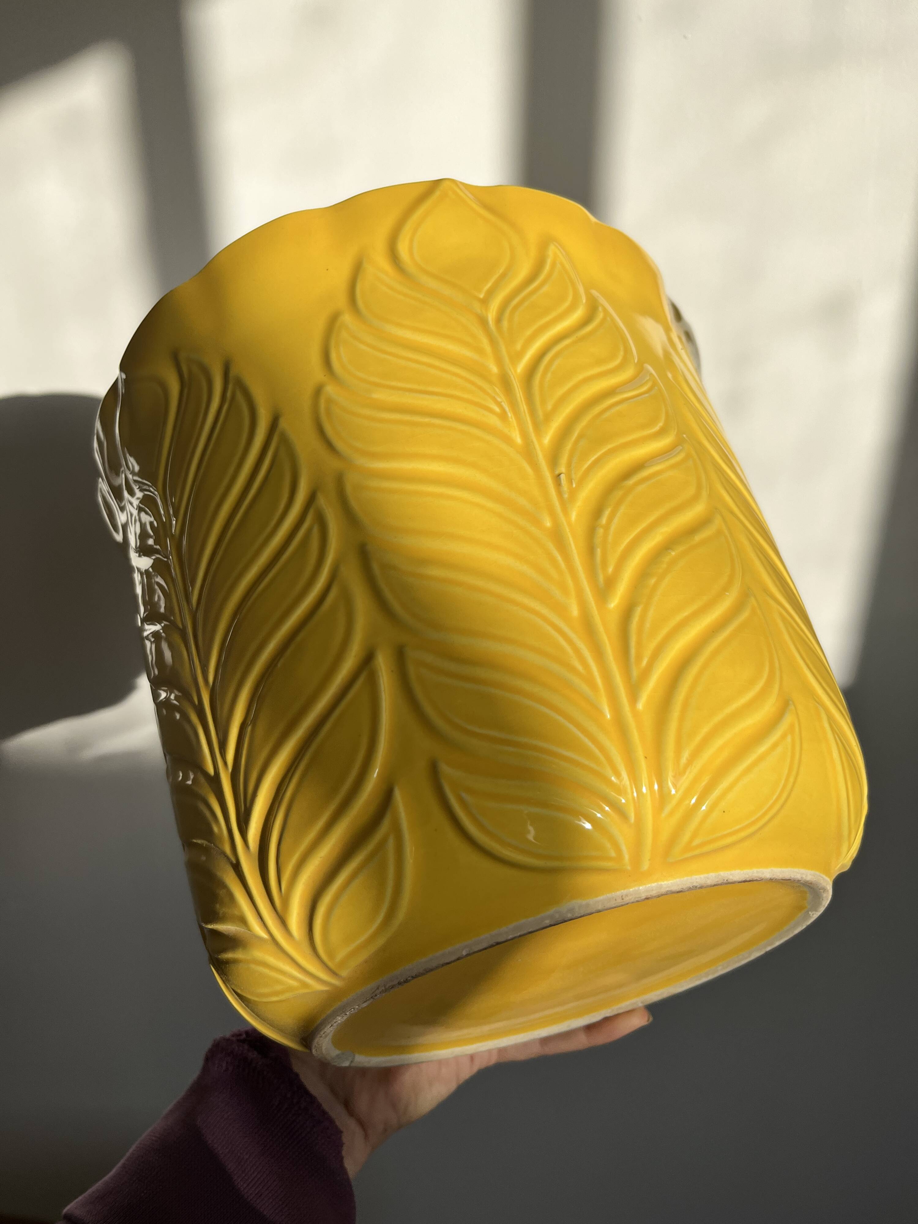 Yellow ceramic plant pot