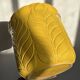 Yellow ceramic plant pot