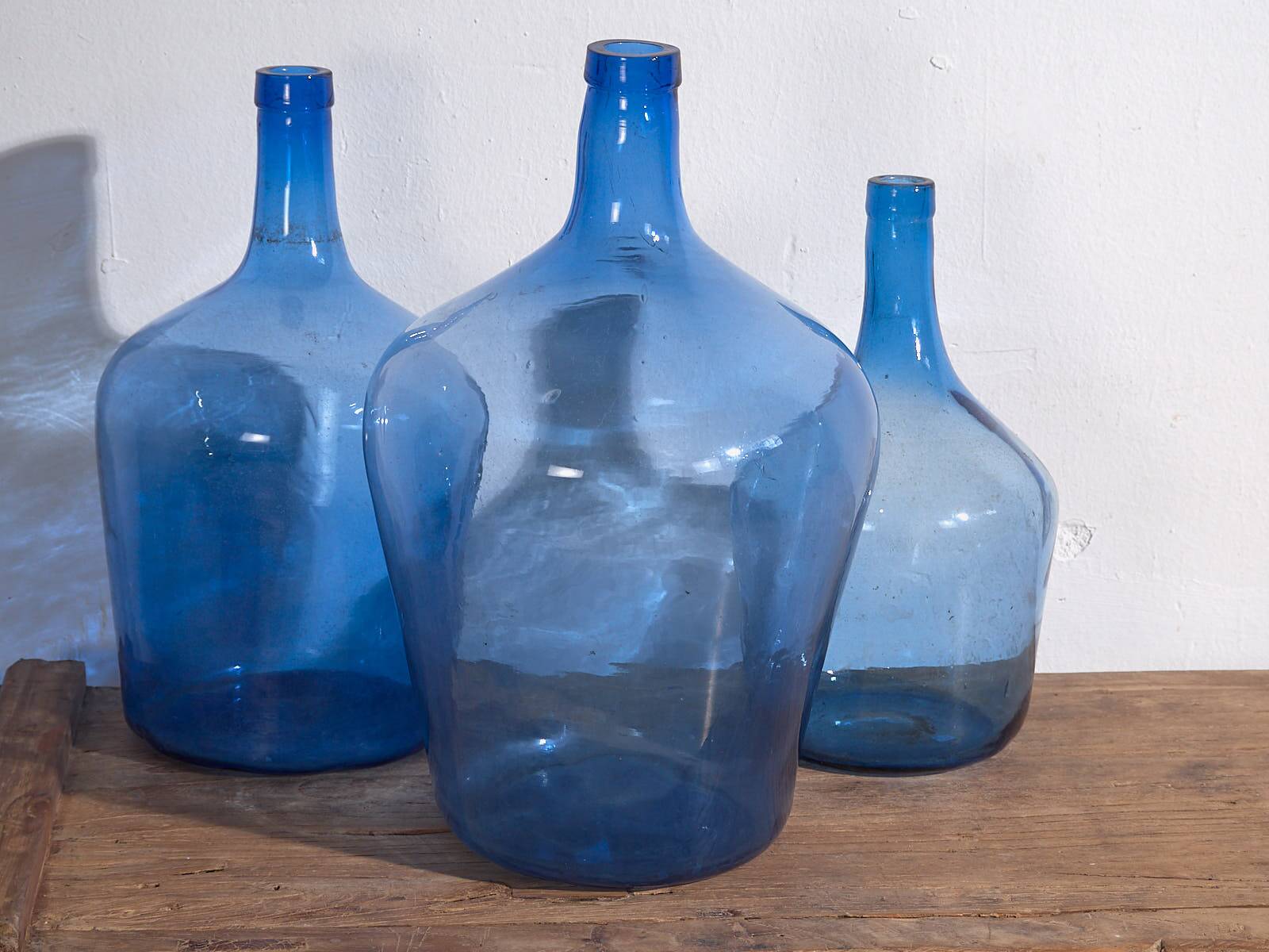 Antique blue demijohns (circa 1920). 3-piece set #1