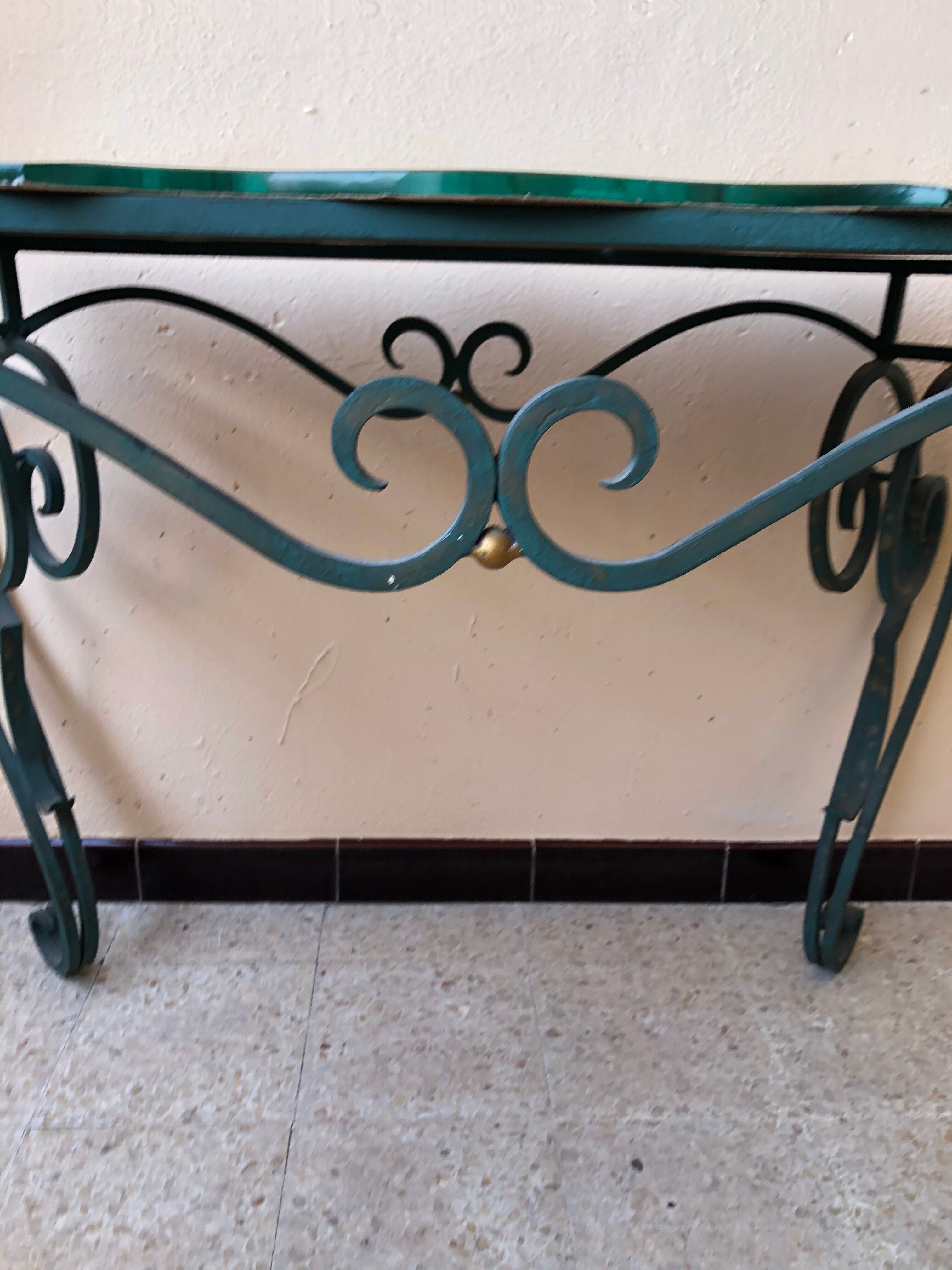 Wrought iron and engraved mirror