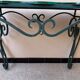 Wrought iron and engraved mirror