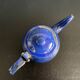 Mini blue enamelled sheet metal teapot