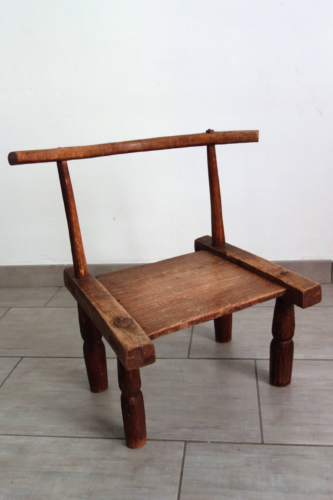 Antique brutalist Baoulé African chair