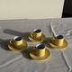 Set of 4 vintage yellow Italian espresso cups and saucers.